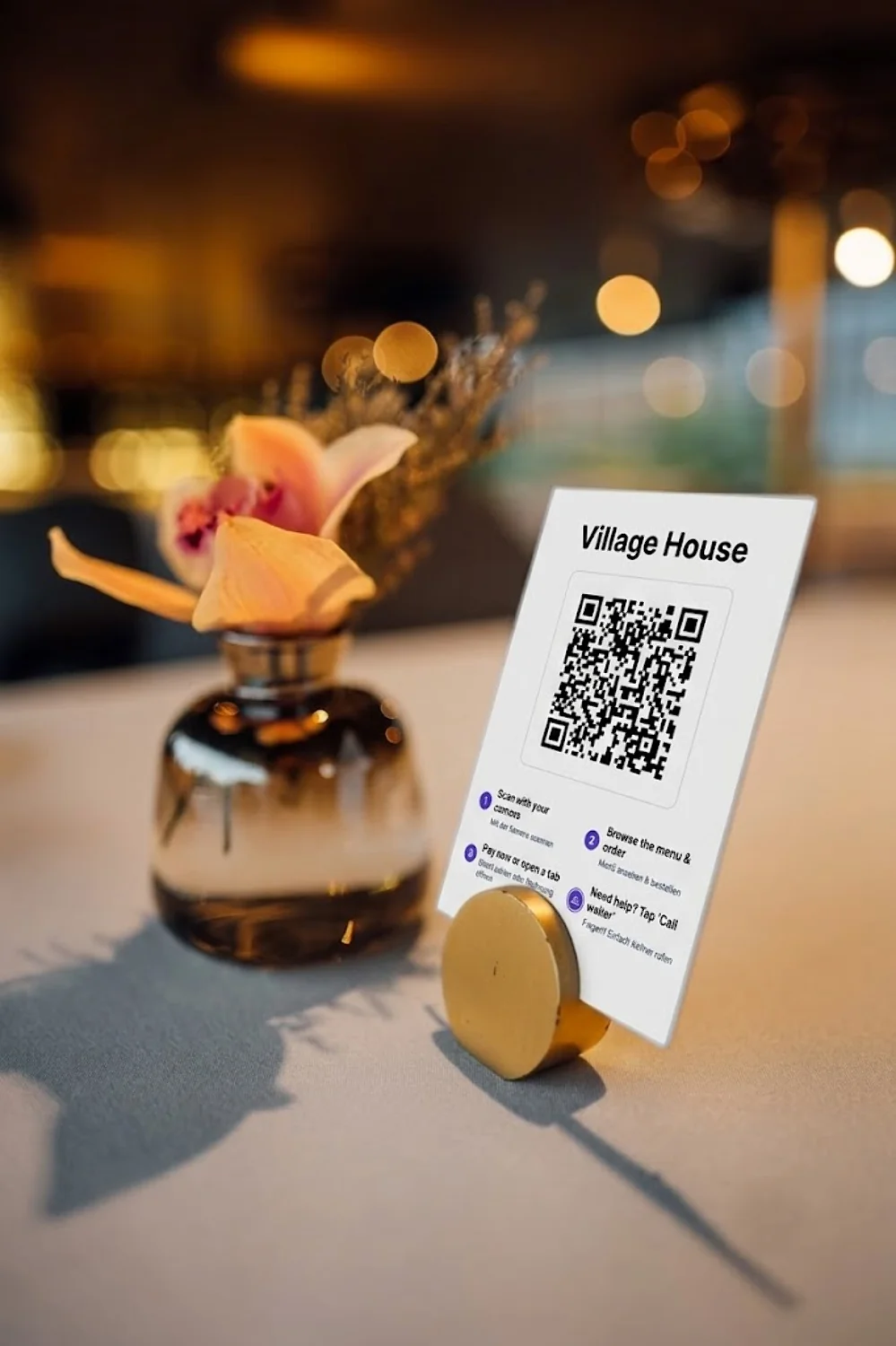 beplated QR code stand on a restaurant table
